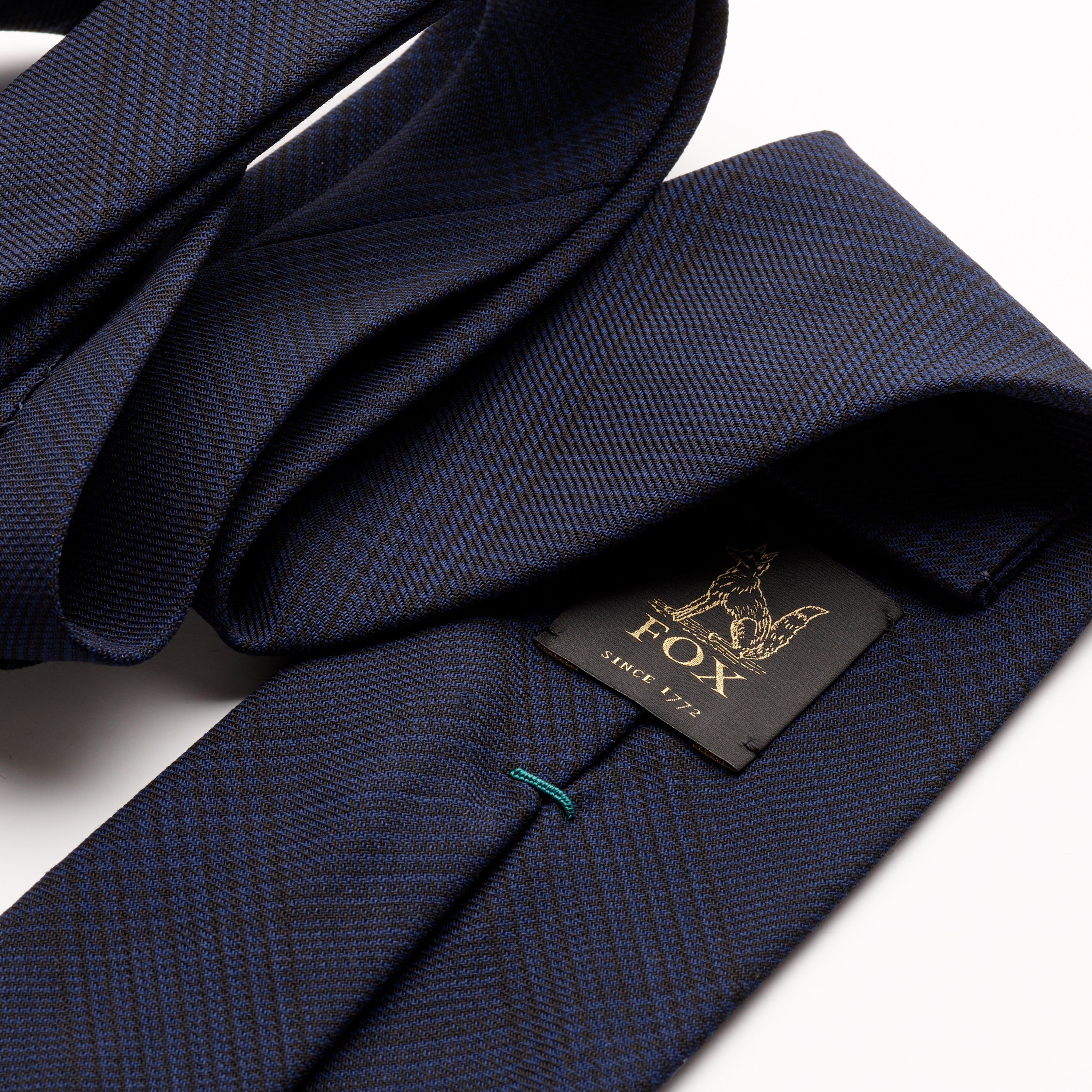 Fox brothers Navy and Black glen check worsted tie, close up of pattern