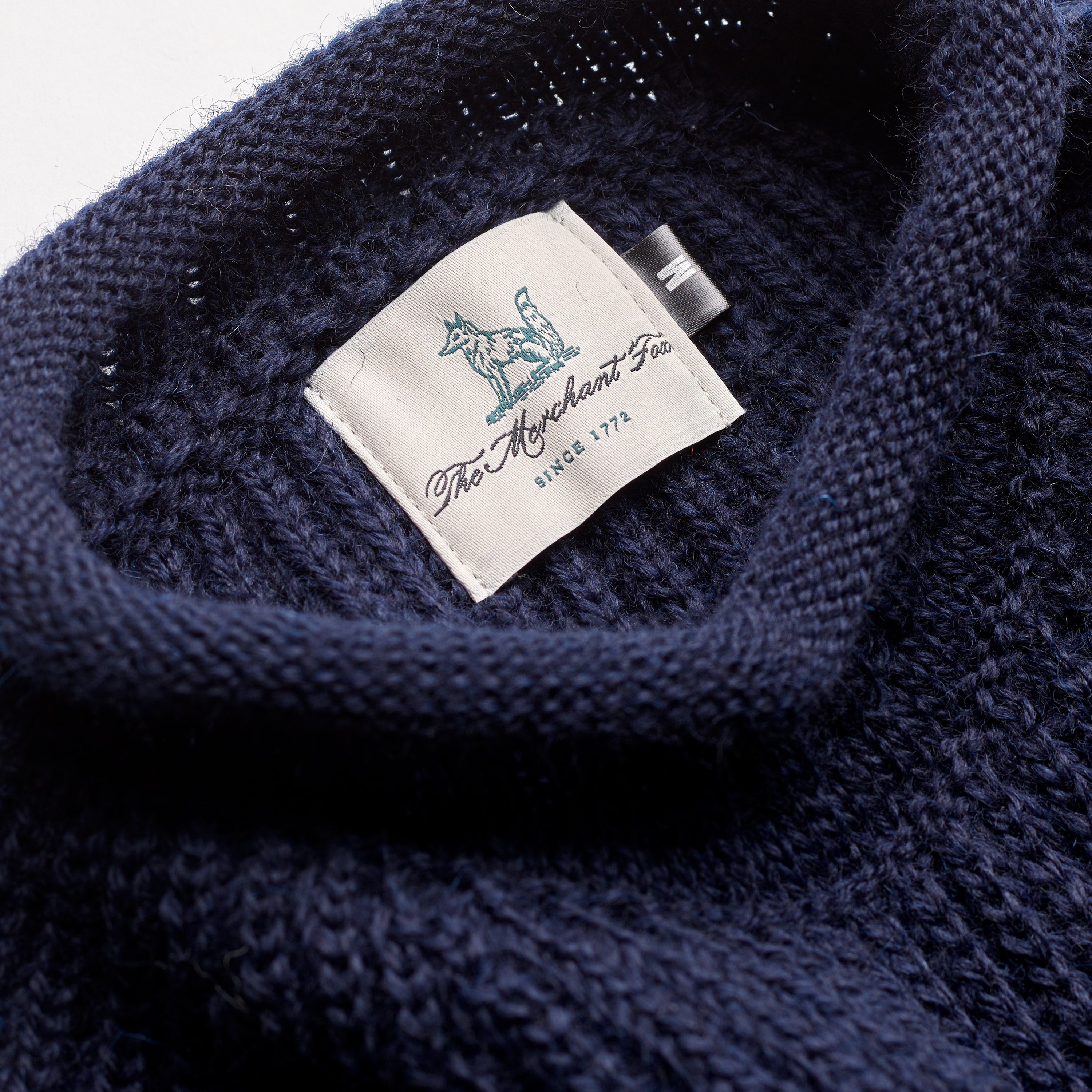 The Fisherman Ribbed Roll Neck Jumper in Navy