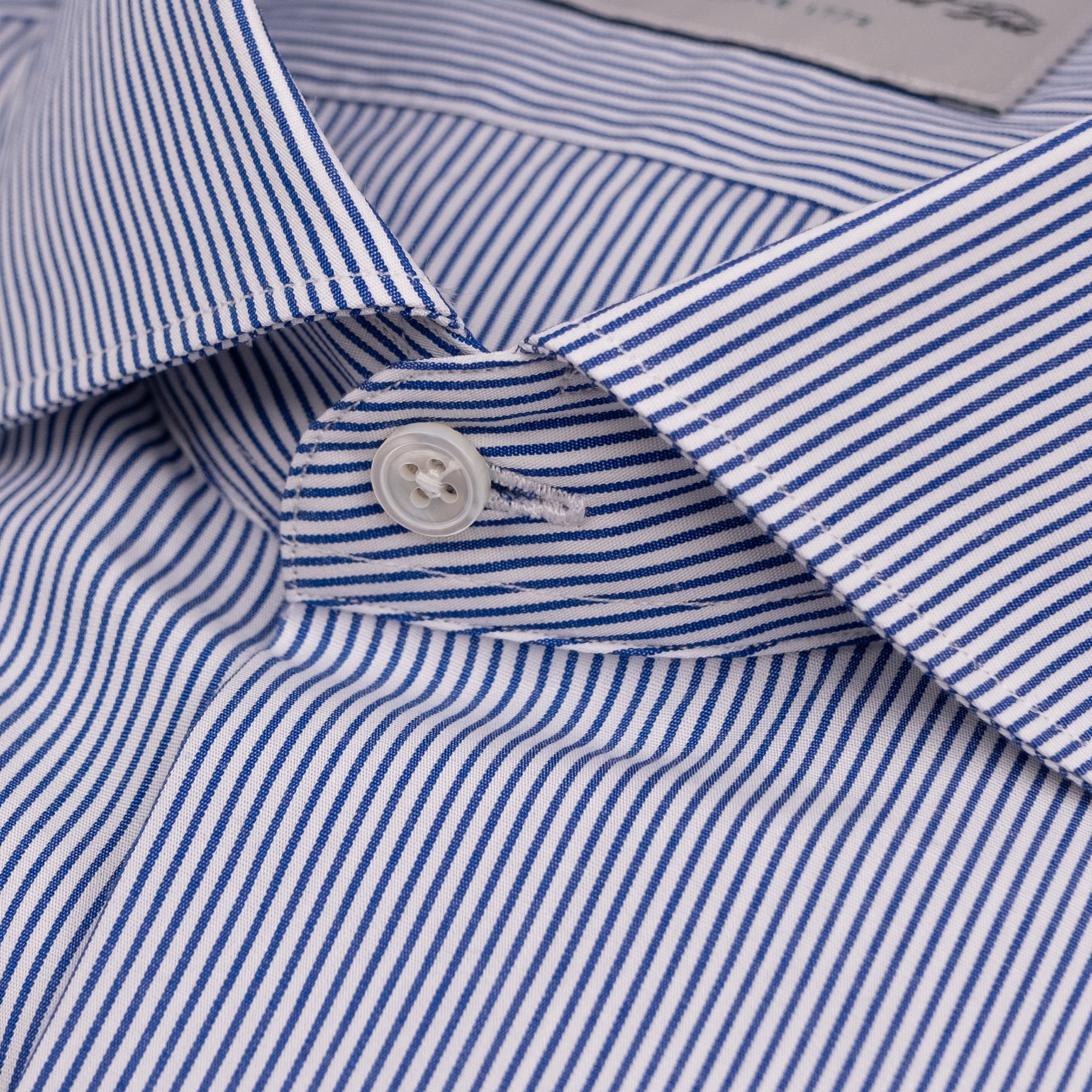 The Niven Fox Classic Navy Popeline Stripe Shirt front button detail