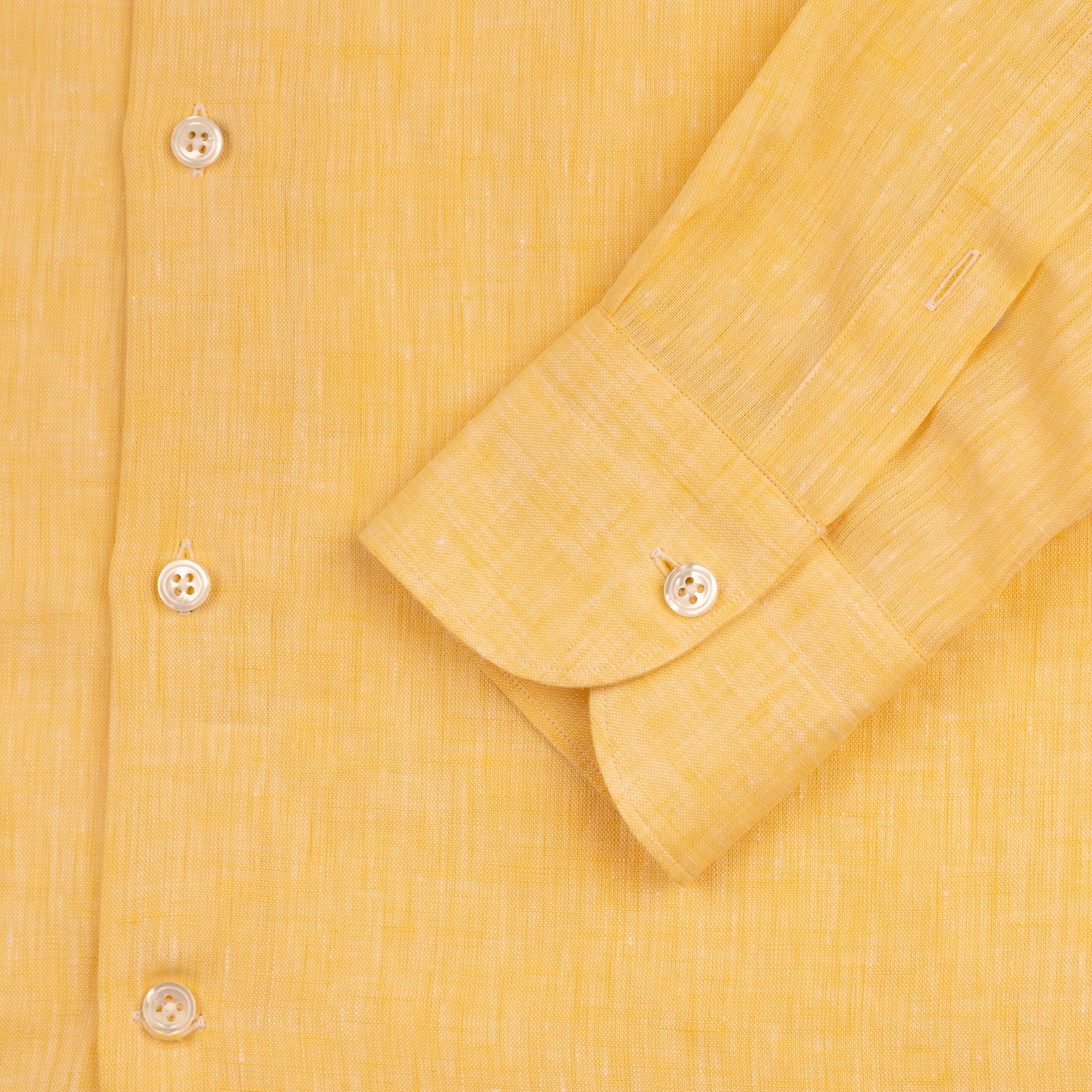 The Niven Fox Summer Yellow Linen Shirt cuff detail