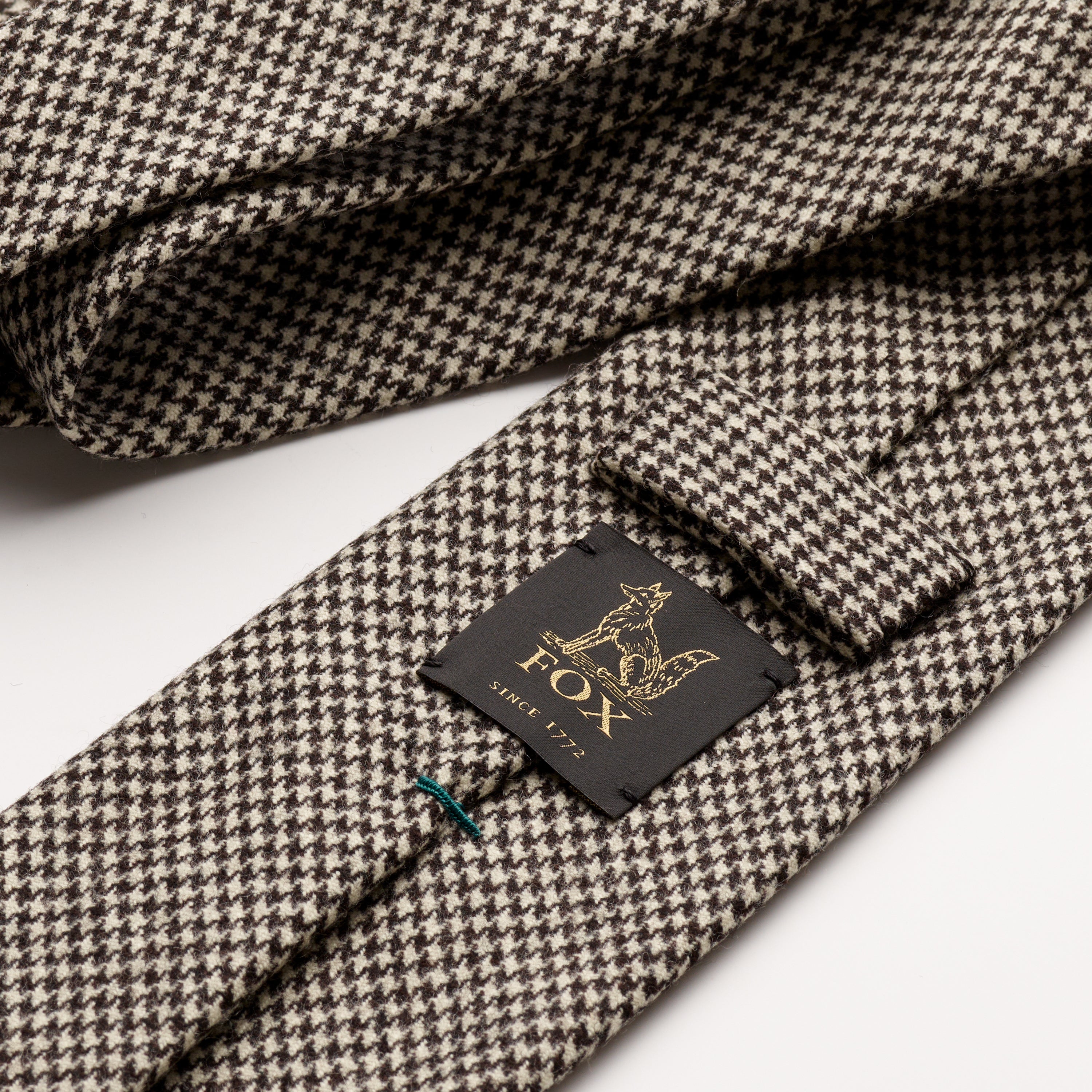 Fox brothers Black & Ecru Puppytooth Flannel tie, close up