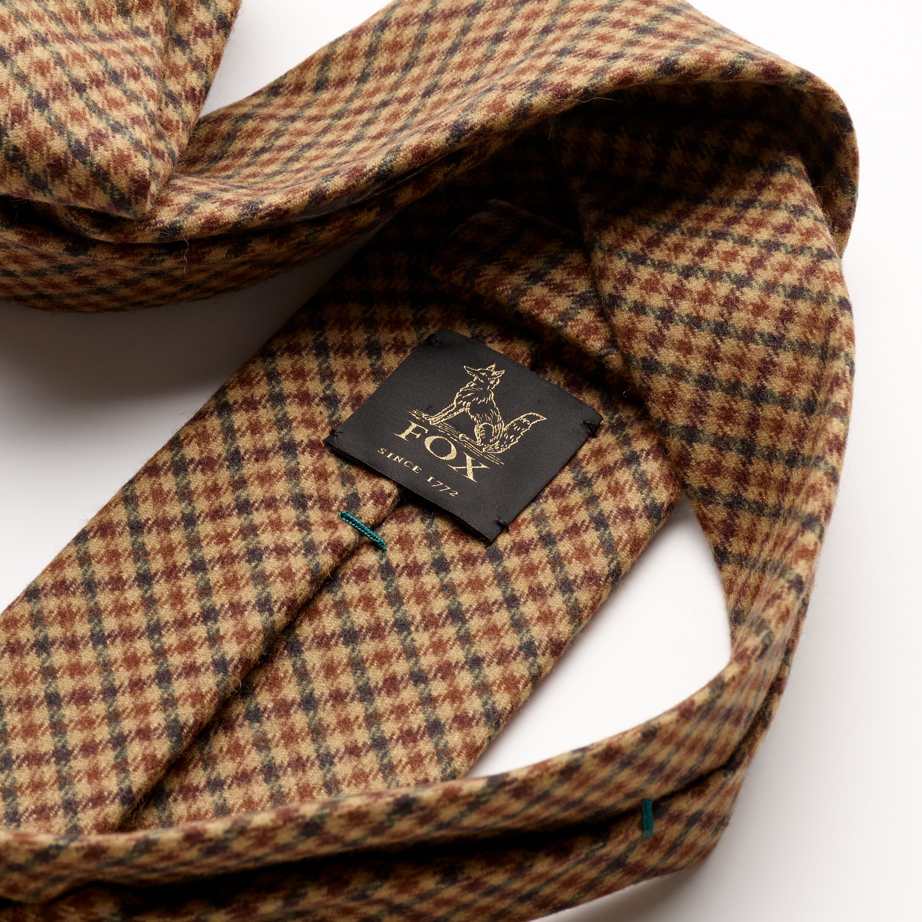 Fox brothers brown and green flannel tie close up