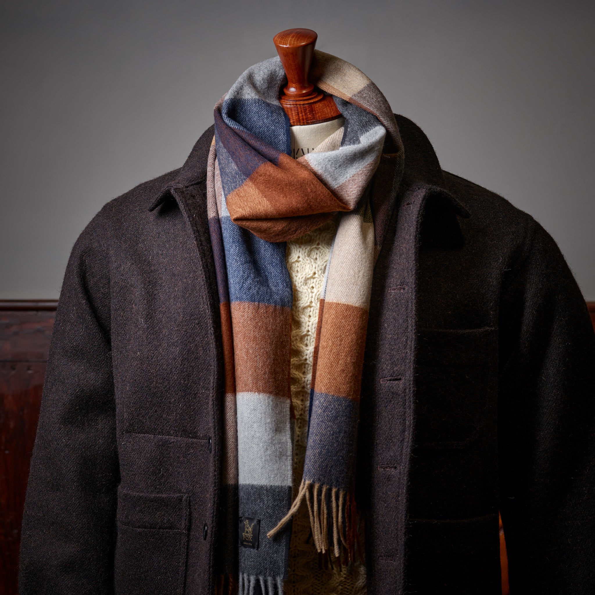 Fox Brown and Navy Cashmere & Wool Check Scarf styled with a Havanna Brown Tours Jacket
