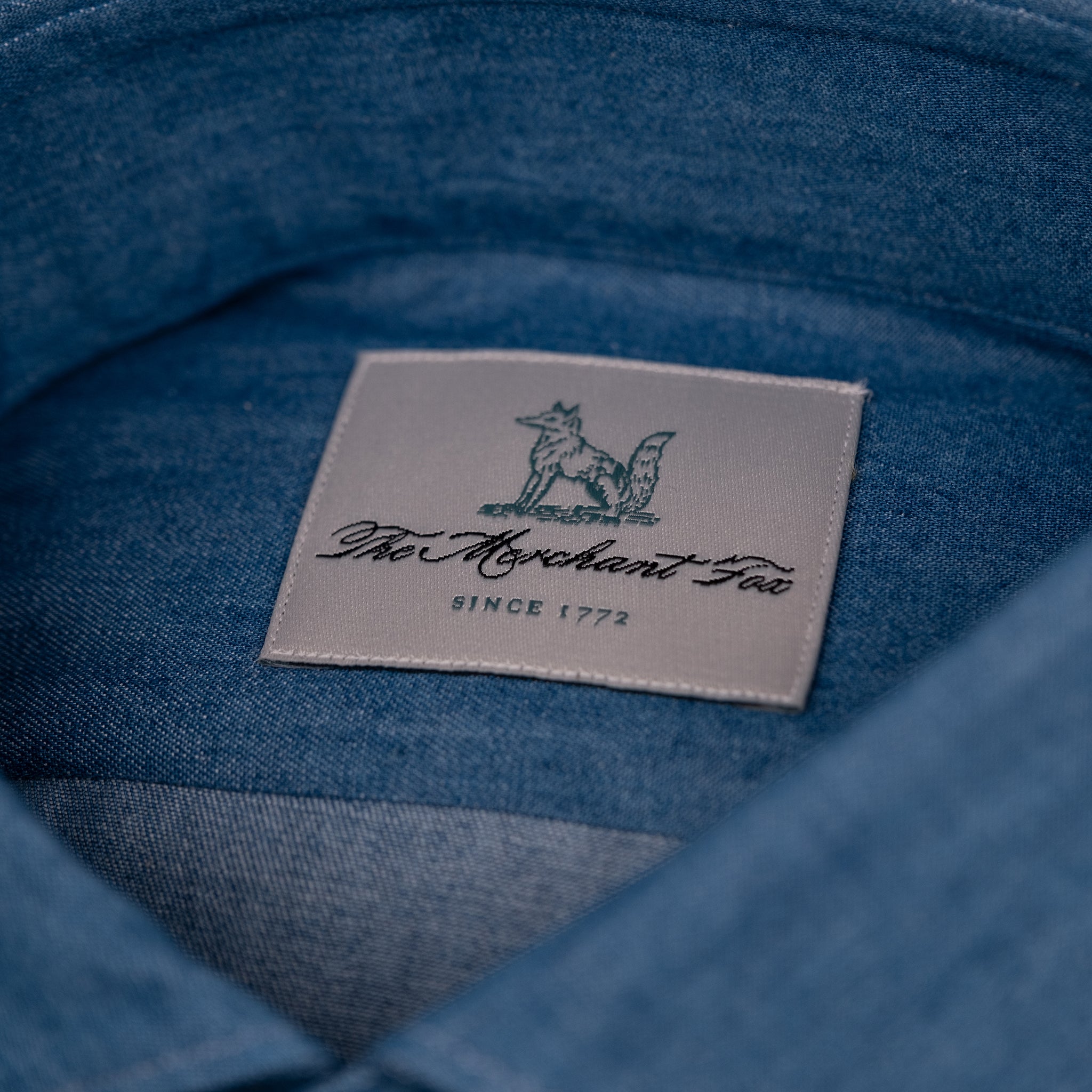 The Niven Fox Weekend Mid Wash Denim Shirt label detail