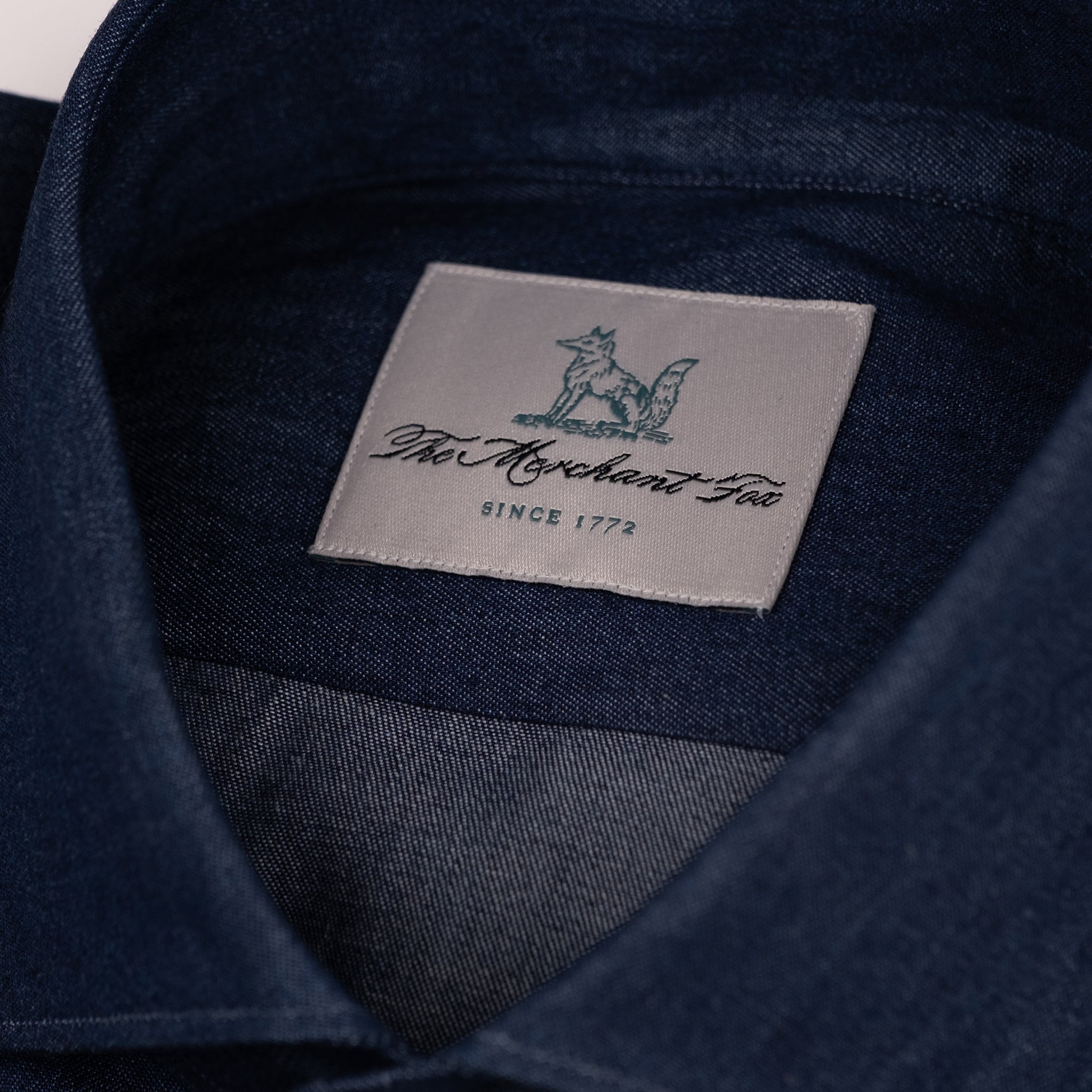 The Niven Fox Weekend Dark Wash Denim Shirt label detail